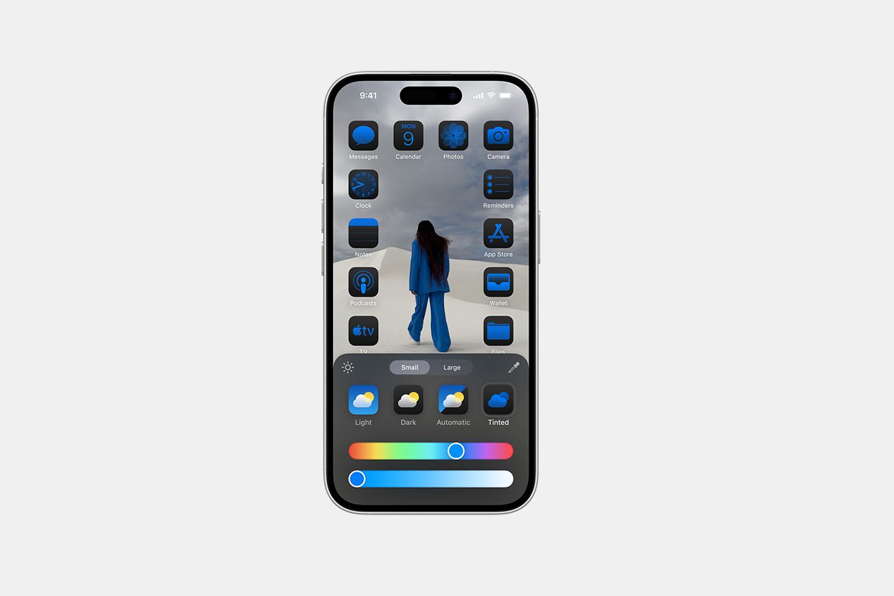 A screenshot of the new iOS 18 home screen with dark-tinted app icons.